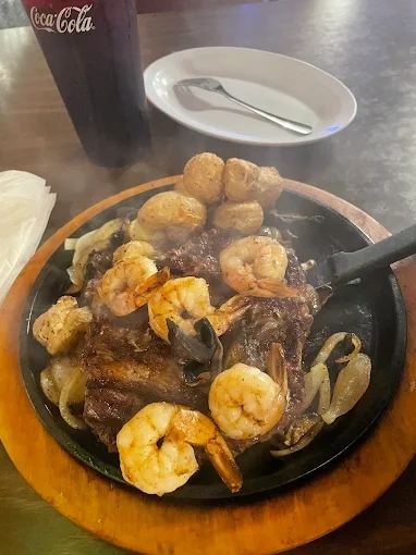 Sizzling cast iron plate at The Horseshoe Grill of Berryville